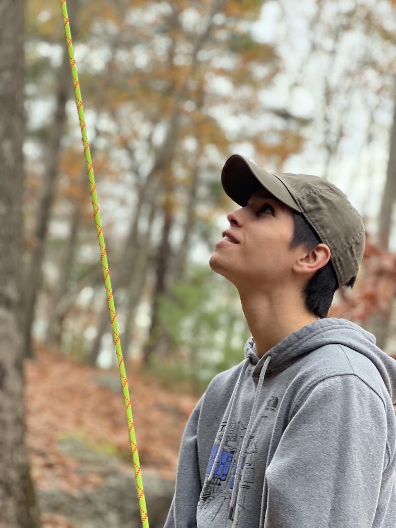 A Northeastern Climbing Club member belaying another climber